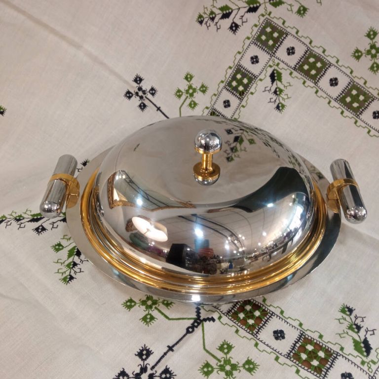 Calienta plato de acero y oro