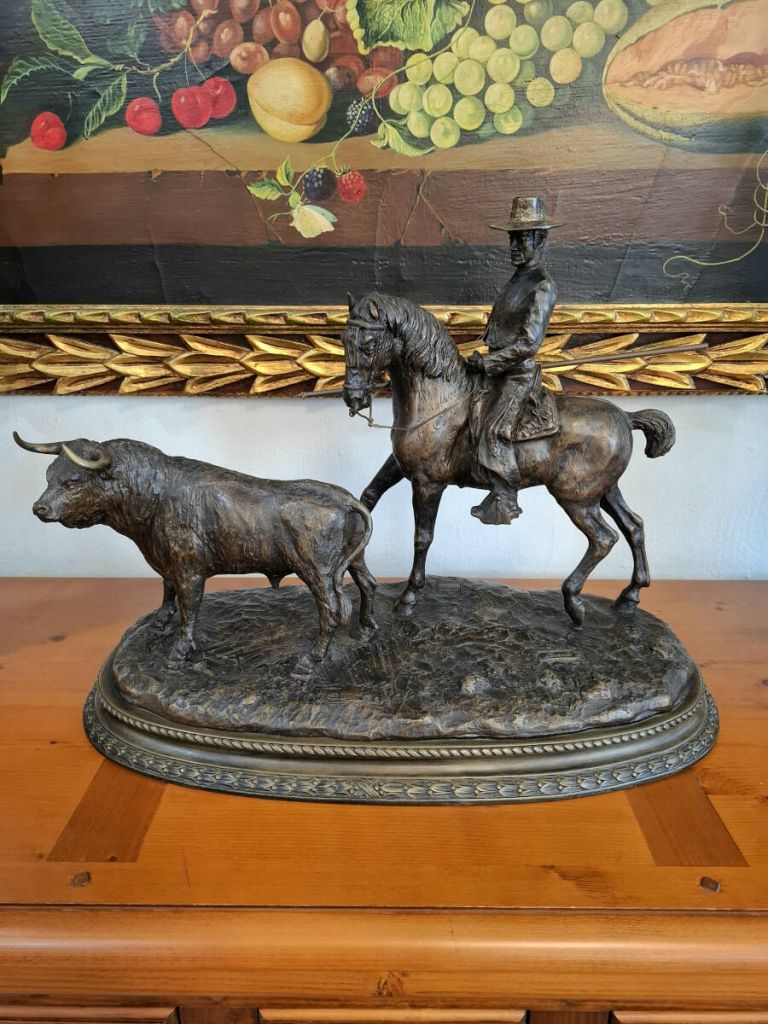 Escultura de bronce jinete a caballo